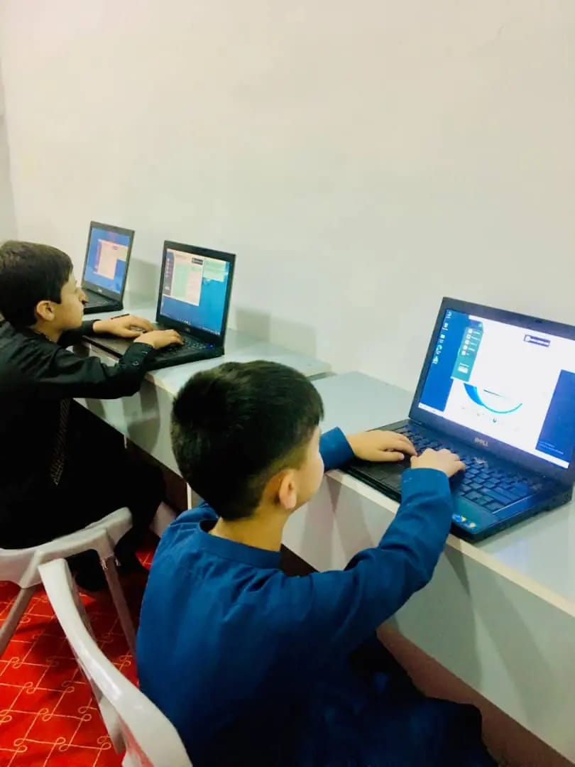 ZAAC students studying computer skills