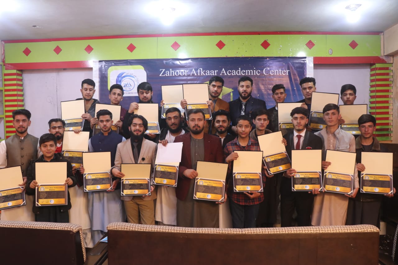ZAAC students receiving graduation certificates